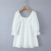 White blouse with ruffled sleeves on a wooden hanger - 3/4 puff sleeves